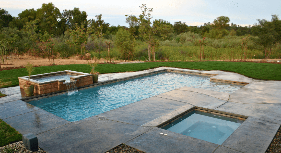 Swimming Pool with trees Sutton Pools Clarksville